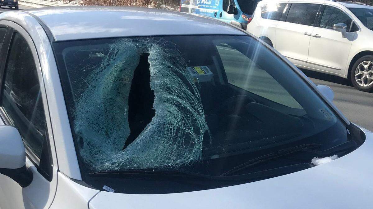 Amanda Grenier said her 6-year-old daughter Avery Monge was injured Thursday after ice fell off an 18-wheeler truck and shattered her windshield in Andover, Massachusetts. Police say they are investigating.