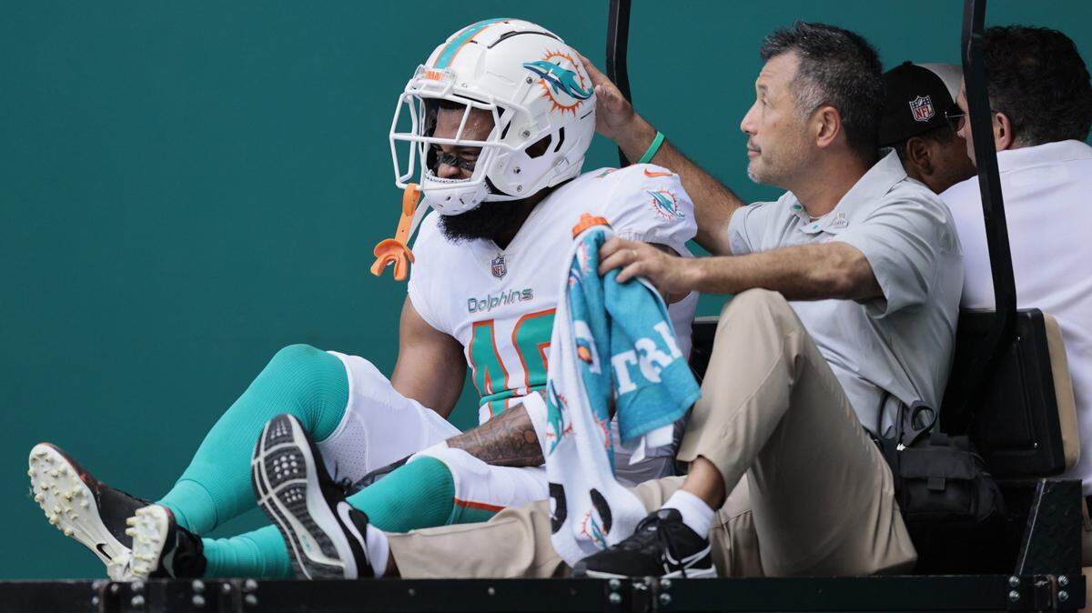 Miami Dolphins cornerback Nik Needham (40) is carted off the field with an injury during the game against the Minnesota Vikings in the second quarter at Hard Rock Stadium in Miami Gardens on Sunday, October 16, 2022.