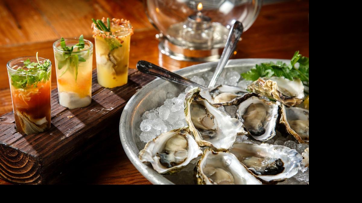 
Oyster shooters: Incorporate flavors that complement but don’t overpower the oysters, like grapefruit and tequila or horseradish and vodka. Here, a trio of shooters and a platter of oysters from Tipple & Brine in Sherman Oaks, California.
