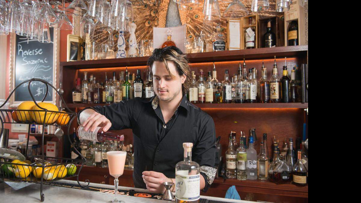 
At The Other Side: Head barman Tim Rabior prepares a cocktail.
