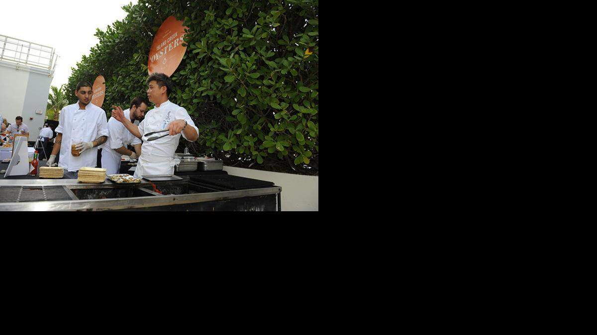 
Chef Hung Huynh attends the 2014 Oyster Bash during the South Beach Wine and Food Festival.
