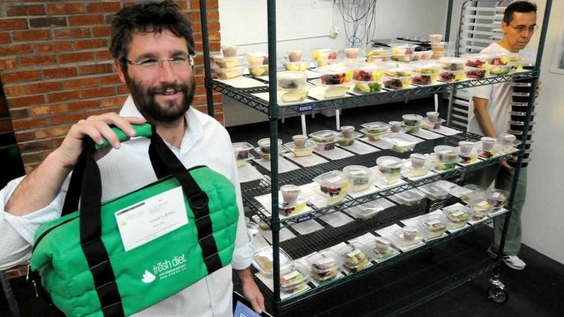 Zalmi Duchman, left, CEO and founder of The Fresh Diet, at their Miami kitchen, October 12, 2010.