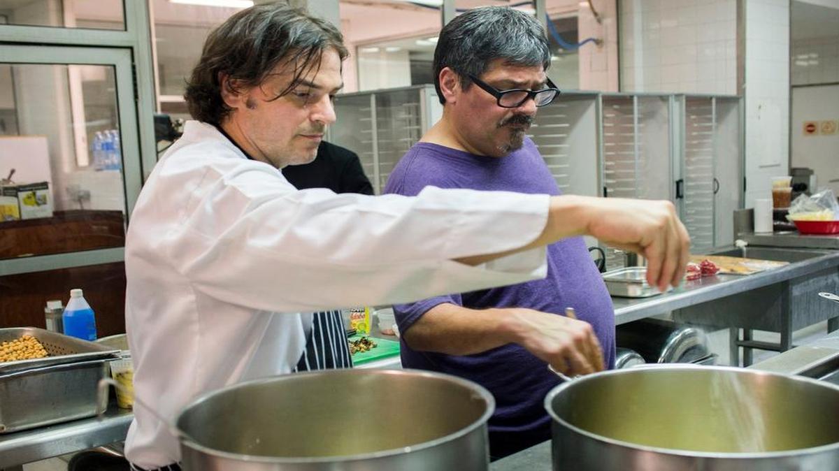 Cuban chef Ricardo Pérez Miranda, of the restaurant Ajiaco, cooks alongside Douglas Rodríguez during one of several events in Rodríguez’s Havana Culinary Exchange. ‘The reason for an event like this is to unite, to share,’ Rodríguez said.