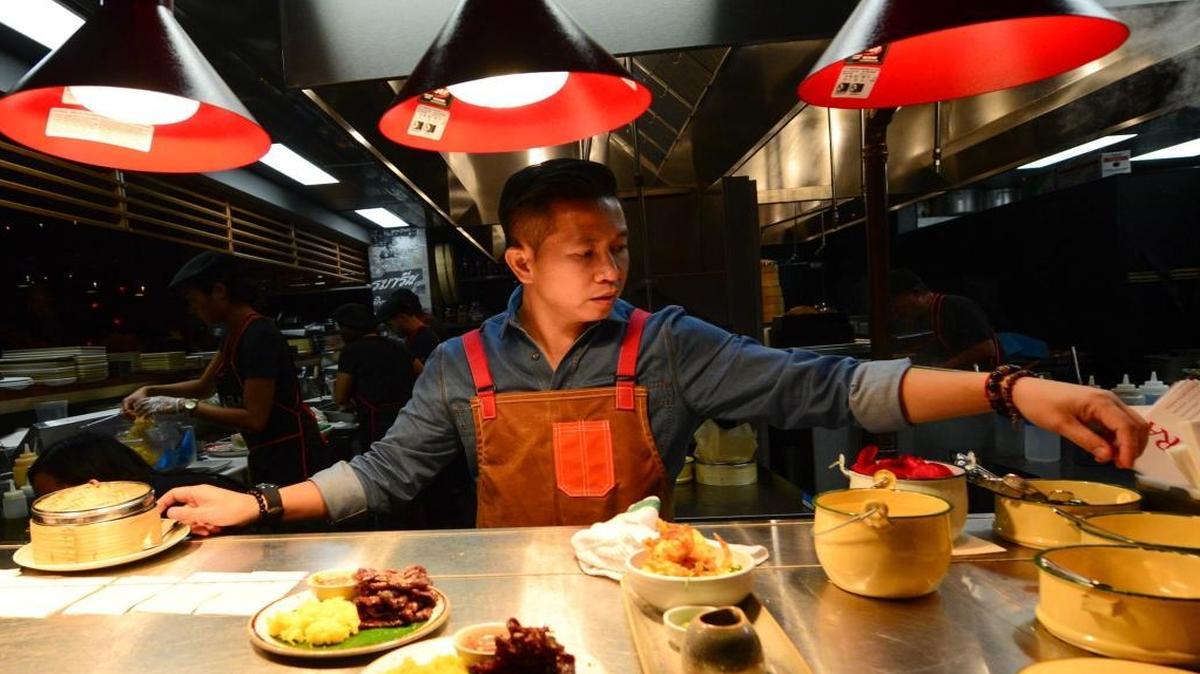 Chef Piyarat Potha Arreeratn, also known as Chef Bee, at his modern Thai restaurant Naiyara in Miami Beach. It opened in mid-December, and business is booming. ‘We didn’t know it, but we opened at exactly the right time,’ he said.