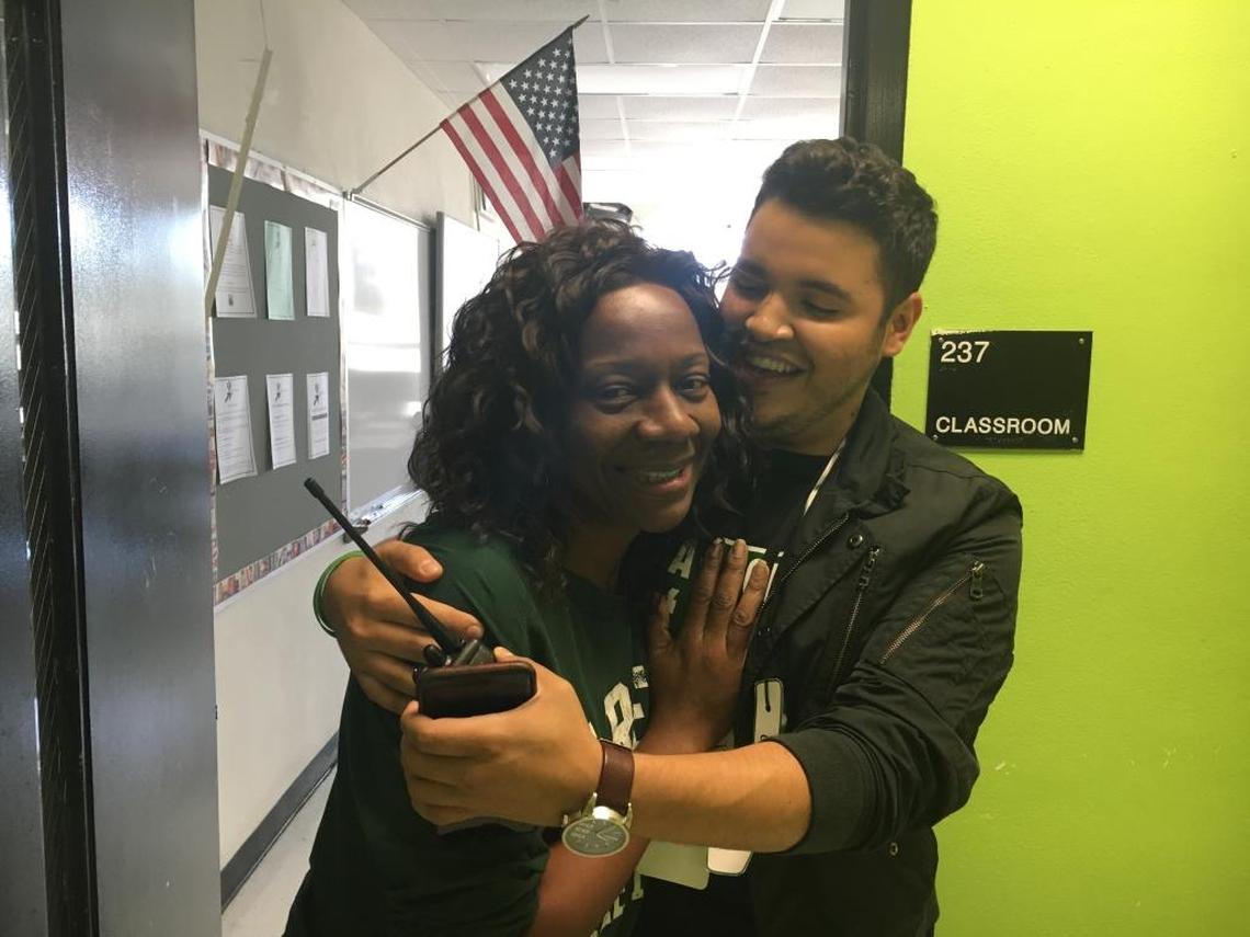 Chef Chris Valdes hugs his former teacher at Felix Varela High, Sharon Hyatt, who had secretly entered him in a cooking competition at Le Cordon Bleu in Miami. Valdes won the contest and a $10,000 scholarship to the cooking school.