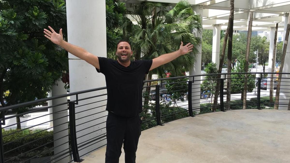 
‘Hello, Brickell!’ Miami nightlife mogul David Grutman stands on a terrace of Komodo, his forthcoming Brickell restaurant. 

