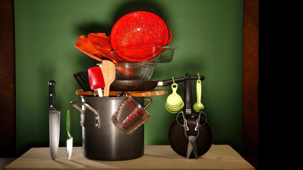 
The basics: It doesn’t take too much equipment to start your cooking life. Have a cutting board and two knives, a spatula and scraper, a wooden spoon, mixing bowls, two skillets (small and large), measuring cups and spoons, kitchen shears, a colander, a small baking dish, a large pot and throw in some pot holders. 
