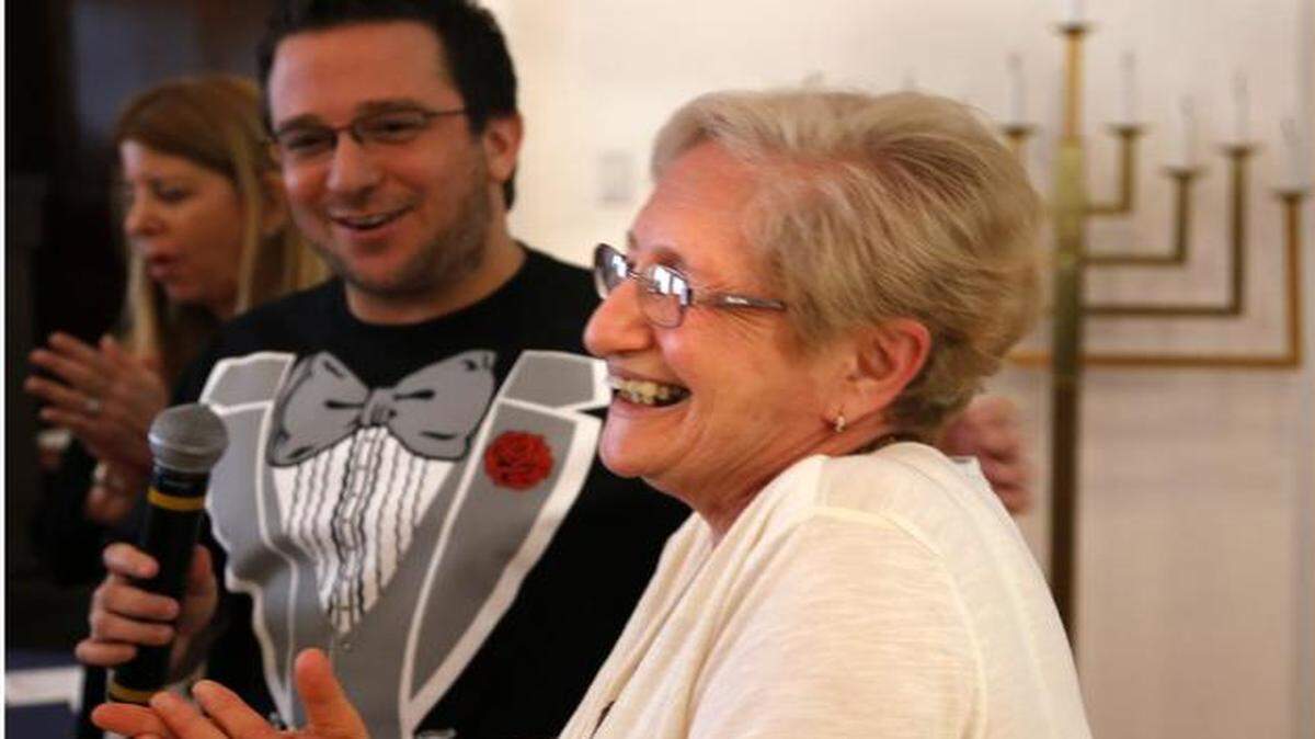 
The only pickle recipe entrant, Eva Shvedova, right, smiles as she is announced the winner by moderator Billy Corben, center. A panel of local chefs and notables named the winners of the Jewish Museum of Florida-FIU in Miami Beach's From My Family's Kitchen recipe contest on Sept. 21, 2014 at the Jewish Museum of Florida - FIU in Miami Beach, Florida.
