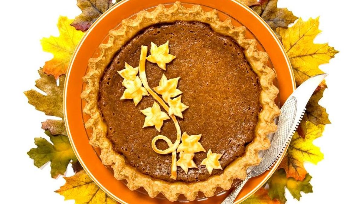 Pumpkin Pie with Mascarpone is adorned with leaves and twigs made from leftover pie dough.