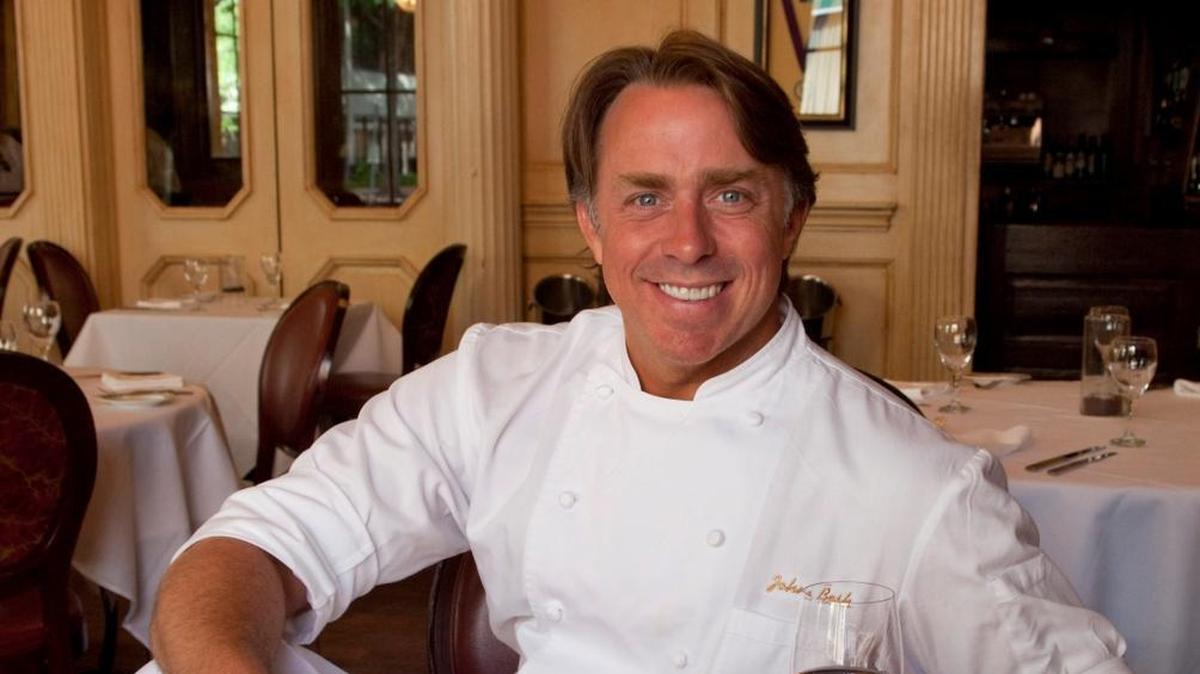 Chef John Besh, seen here at his New Orleans restaurant August in 2010, has pulled out of the February 2018 South Beach Wine and Food Festival after allegations of sexual harassment at his restaurant group.