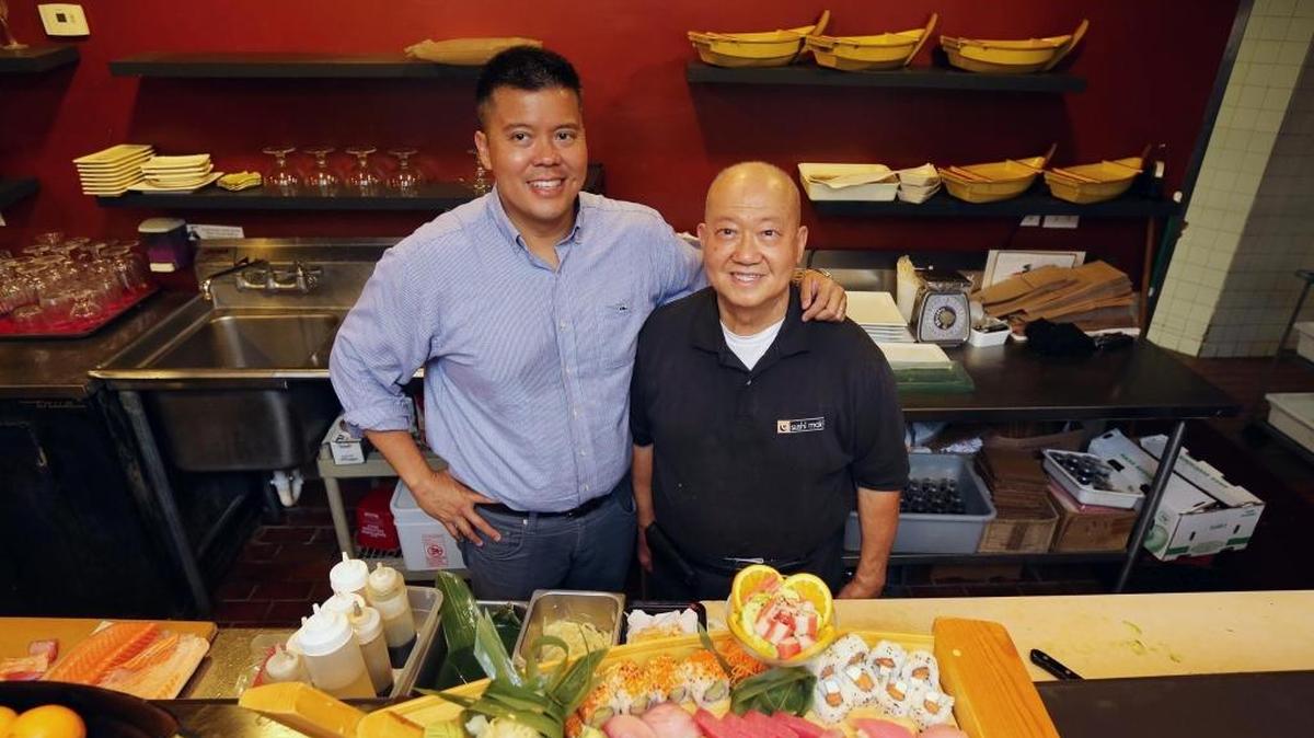 From left, Abe Ng and his father, Allan Ng, at the Canton Restaurant in Coral Gables on Saturday, May 27, 2017.