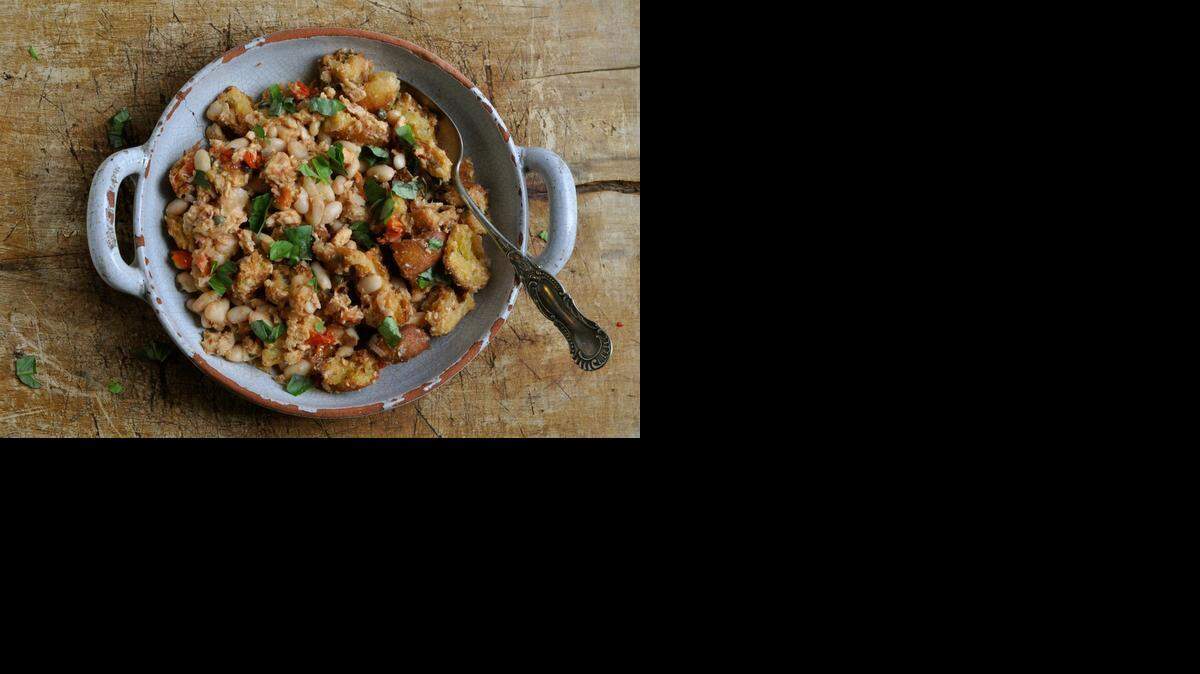 
New tuna salad: Warm white beans and tuna make an updated version of a classic Italian salad. 
