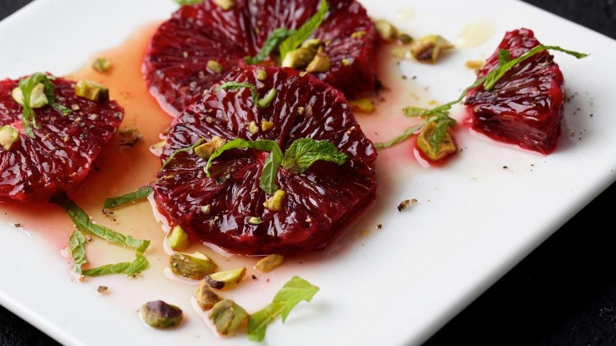 Oranges With Mint-Infused Honey and Toasted Pistachios.