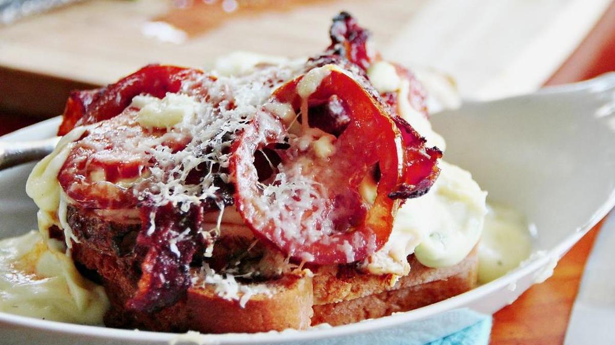Kentucky Hot Brown with Manchego-Jalapeño Mornay Sauce comes from the book “Southern Heat: New Southern Cooking Latin Style.”