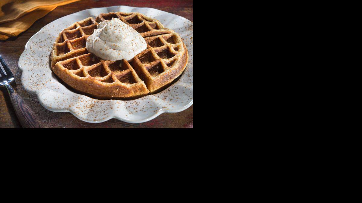 
Give it a shot: Eggnog Waffles with Cinnamon Whipped Cream only require one tablespoon of bourbon, which means you can add a kick to your dessert without draining the bottle.
