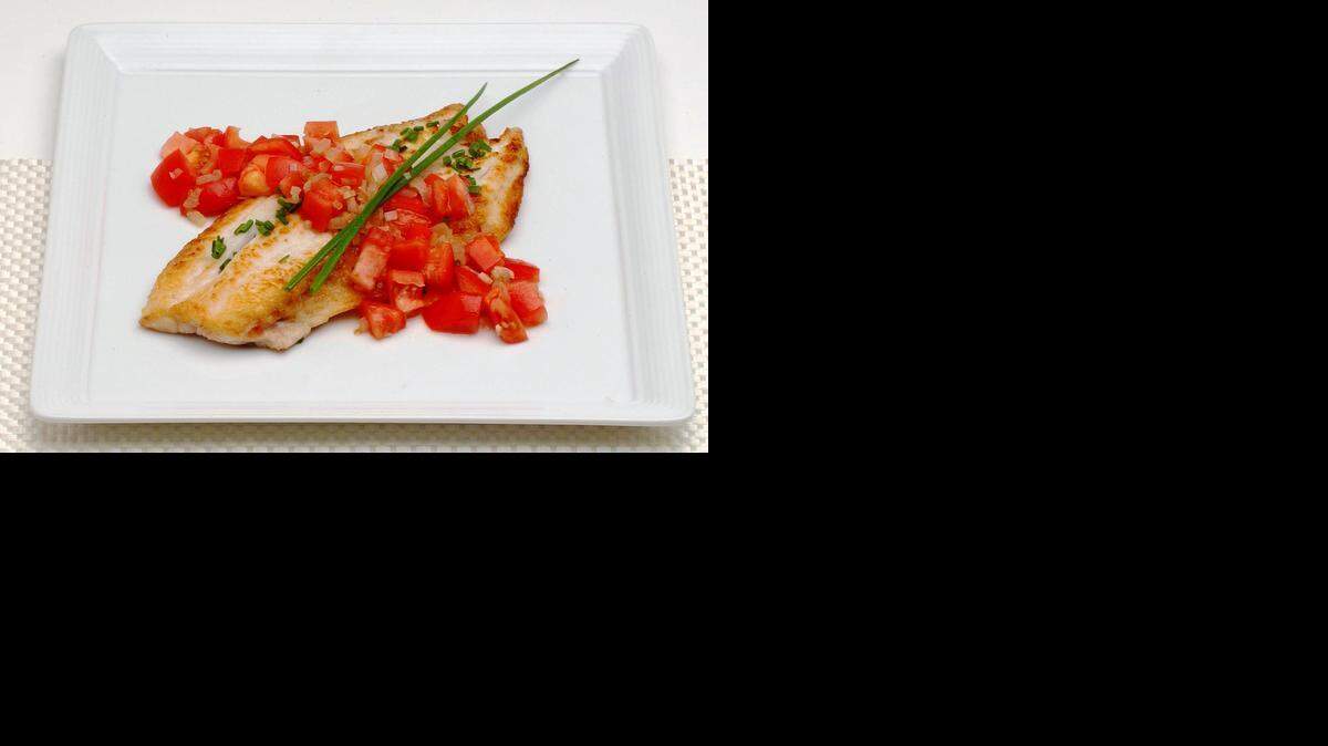 
Heavenly Hogfish: With tomatoes, shallots and chives. 
