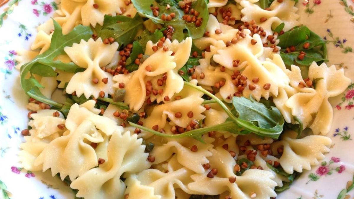 Lighten up farfalle and kasha with greens and lemon.