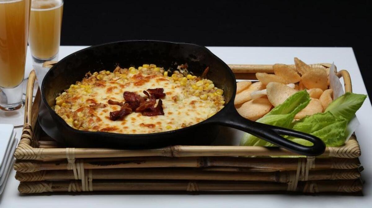Bacon and cream cheese are used to “turbocharge” this Korean drinking snack from “Lucky Peach Presents 101 Easy Asian Recipes.”