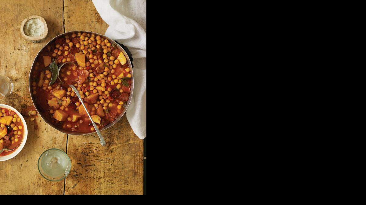 
From The Cuban Table: A stew of potatoes and garbanzo beans. 
