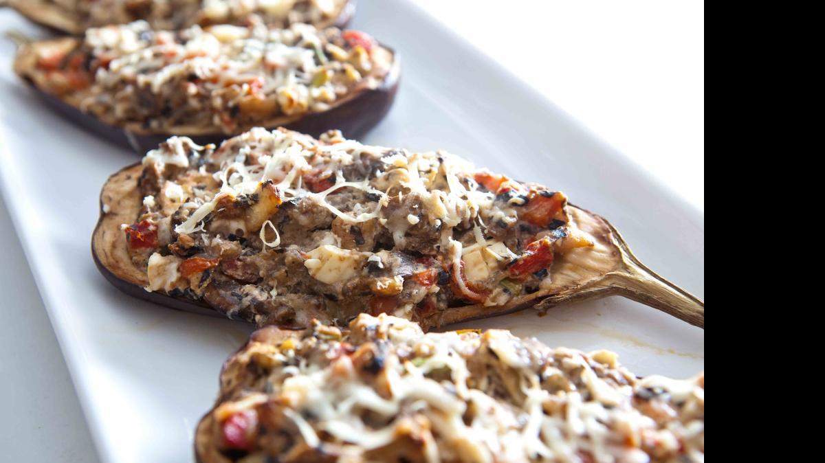 
Italian-style eggplant: Stuffed with mushrooms and tomatoes, and topped with pecorino cheese. 
