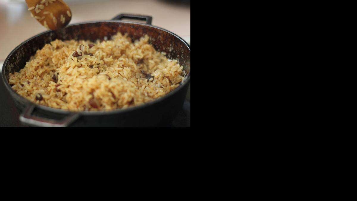 
Colombian-style: Coconut rice is served as a side dish with fish, tostones and salad. 
