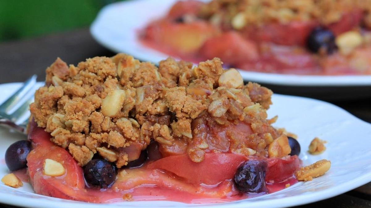 Peach-berry crisp with peanuts and oatmeal.