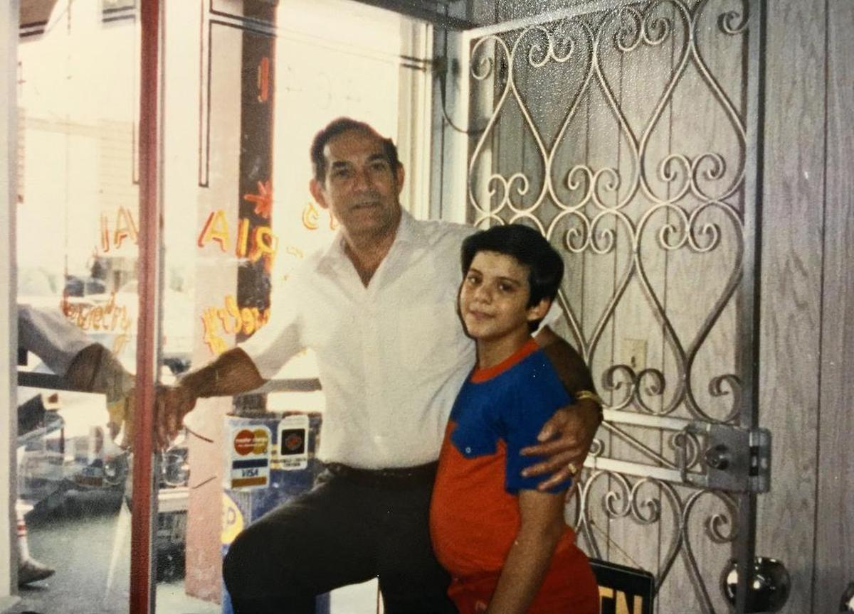 Writer Carlos Frias grew up in his parents’ Carol City jewelry store, where his father, Fernando Frias, would put an apron on over his shirt and tie and cook in a small kitchen in the back of the store.