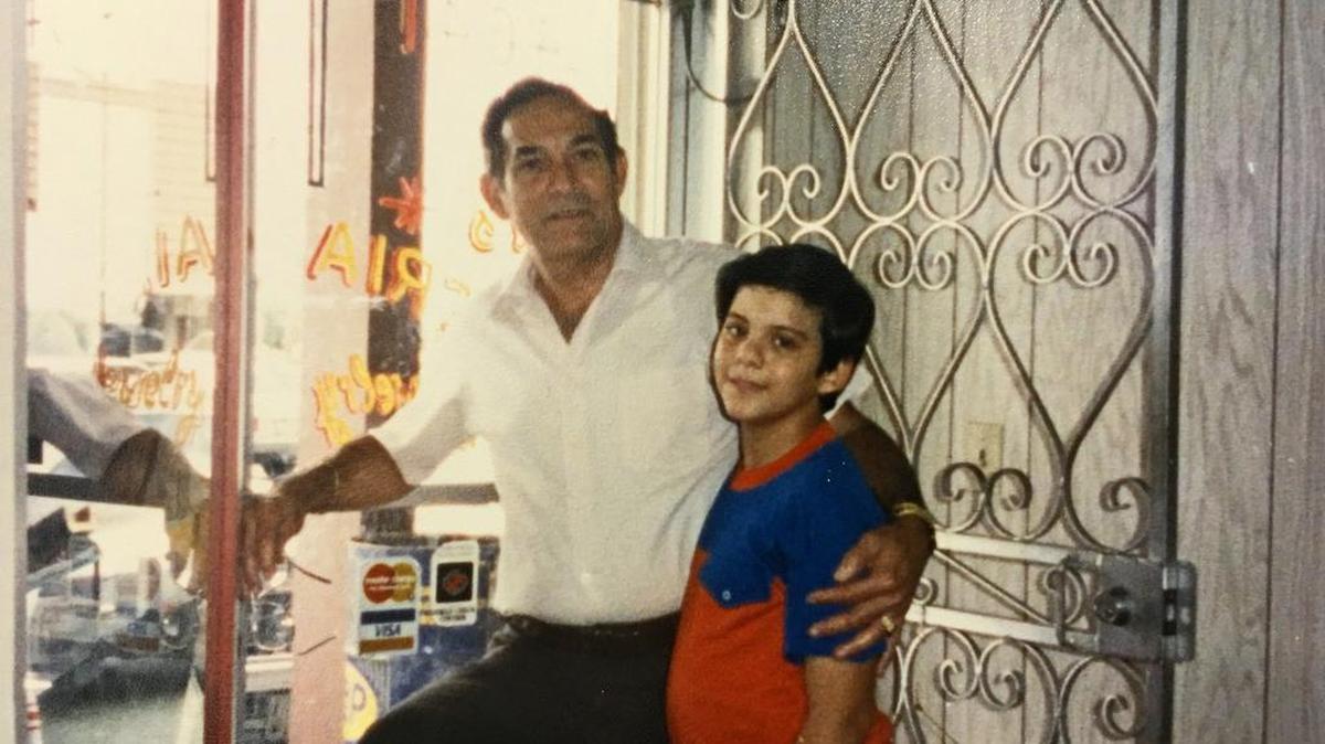 Writer Carlos Frias grew up in his parents’ Carol City jewelry store, where his father, Fernando Frias, would put an apron on over his shirt and tie and cook in a small kitchen in the back of the store.