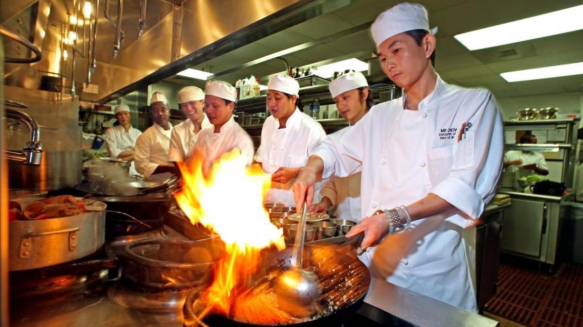 Chef Xiao Lei Shao cooks at Mr Chow restaurant in the W Hotel in South Beach in this July 2010 photo.