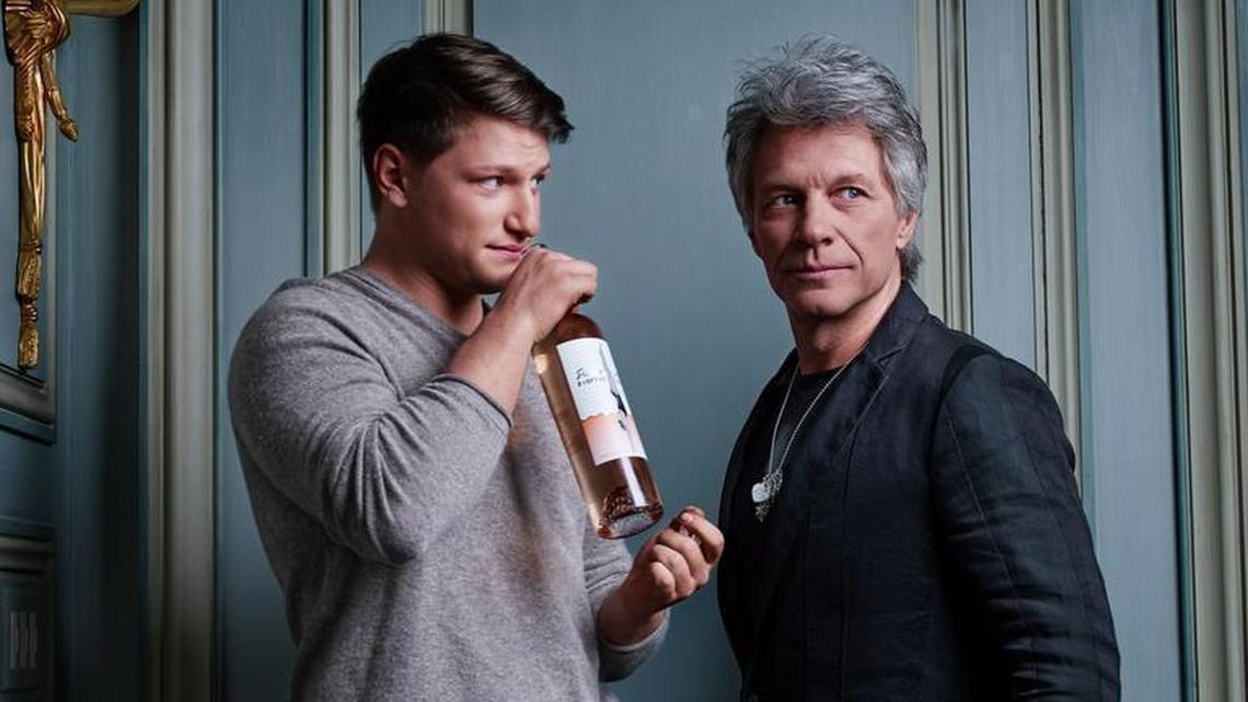Jon Bon Jovi, and his 23 -year-old son Jesse Bongiovi, left