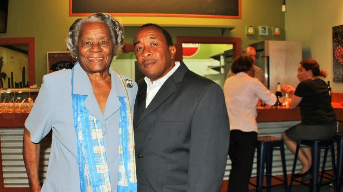 Longtime Miami-Dade leader and community activist Thelma Gibson, left, and Lair Hall, treasurer of the Thelma Gibson Health Initiative, attended a preview reception this month for Canteen Cuisine, set to open at 3646 Grand Ave.