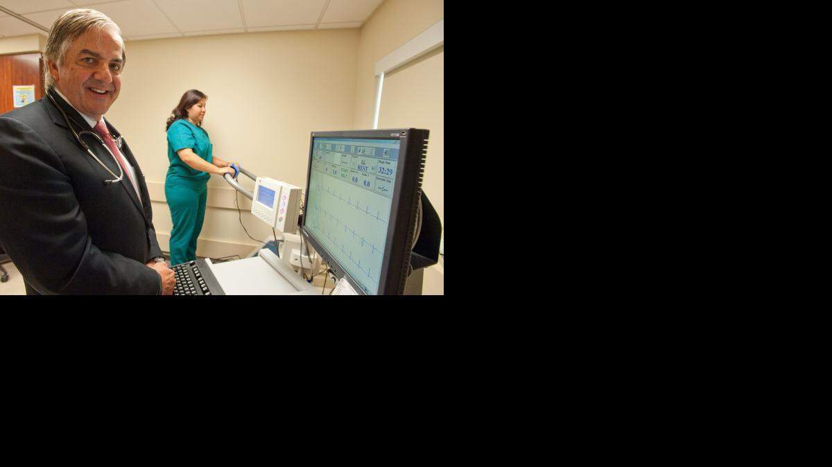 
AT SOUTH MIAMI HOSPITAL: Dr. Theodore Feldman  and cardio tech Josie Mujica demonstrate a stress test.



