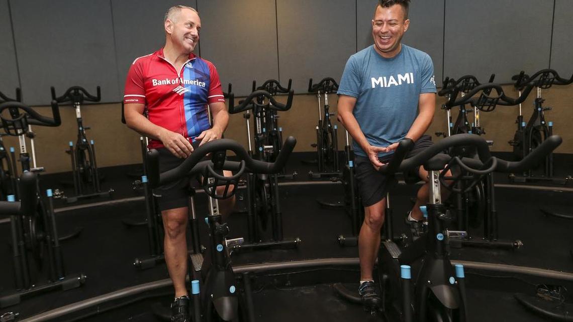Jeff Patrick, left, and his partner, Allen Putman, trained at the cycling facility at Flywheel Gym in Miami Beach before their California trek.