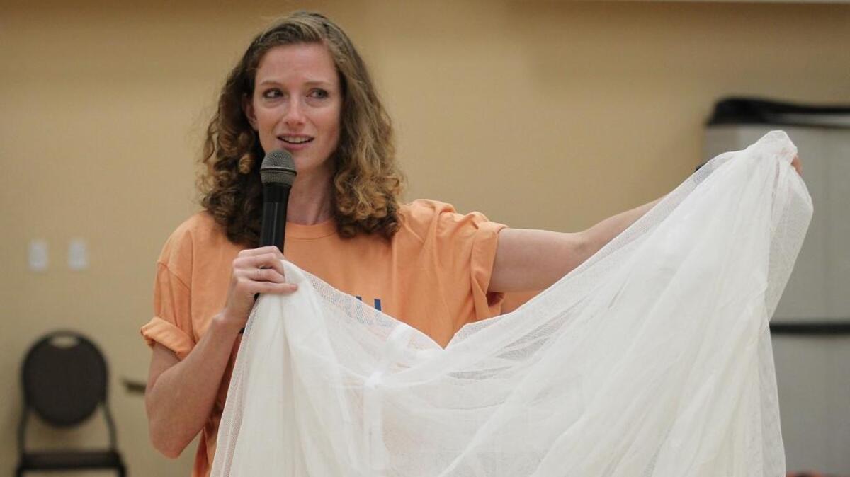 Rabbi Rachel Greengrass talks about the benefits of mosquito netting at Temple Beth Am on Sunday, April 24, 2016.