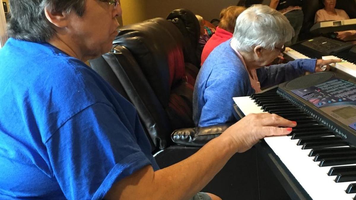 Participants in the Mind&Melody program play the keyboards and learn about basic music theory at My New Oasis Assisted Living Facility in Miami. The nonprofit Mind&Melody uses music to help people with dementia and Alzheimer’s disease