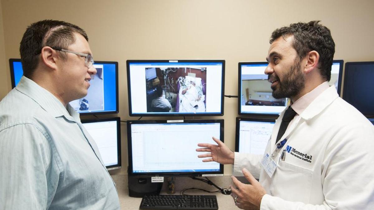 
The same page: Nicholas Fotopoulos talks about his most recent operation to treat his epilepsy with Dr. Tarek Zakaria, a Memorial neurologist.
