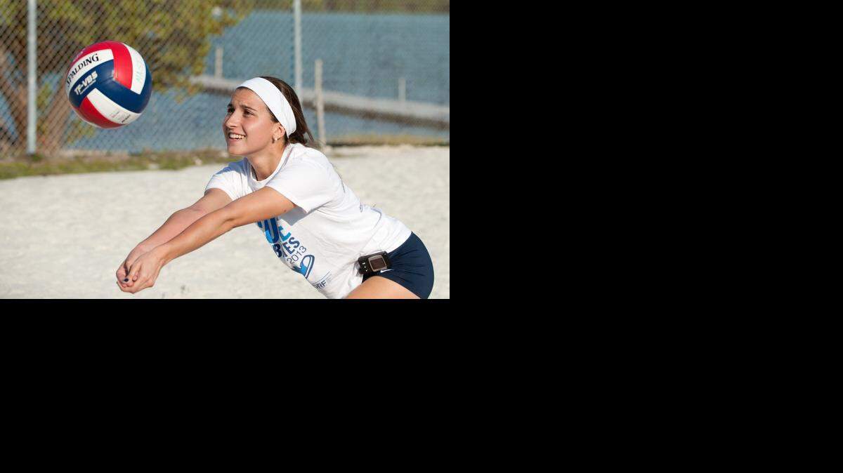 
Enid Sosa, a senior at Maritime and Science Technology Academy, demonstrates her volleyball skills at the school, Friday, Nov. 14, 2014, in Virginia Key. Enid lives with type I diabetes and leads a support group at Miami Children's Hospital.
