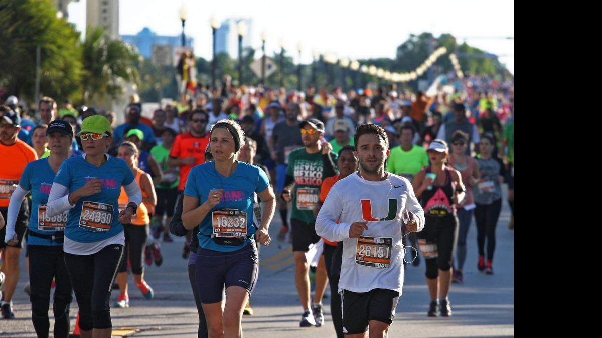 
ON THE RUN: Runners cross the Venetian Causeway during the 2015 Miami Marathon and Half Marathon.
