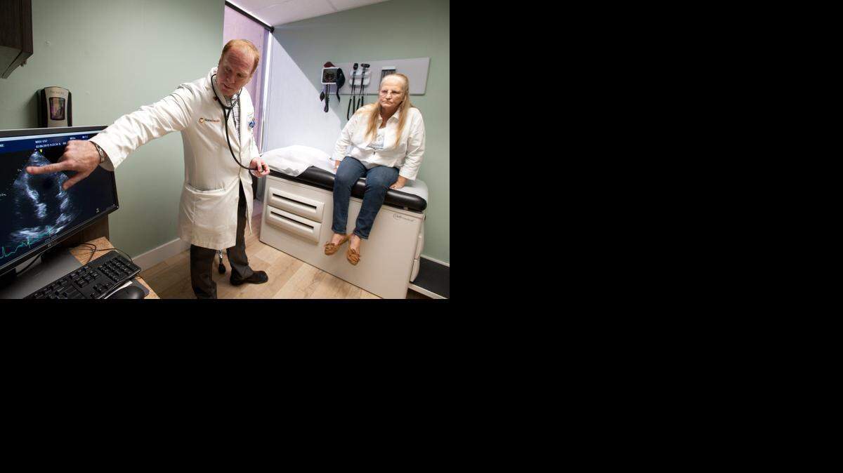 BROKEN HEART SYNDROME:  Dr. Adam Splaver, director of echocardiography at Memorial Healthcare System, meets with patient Jane Casey of Hollywood. Casey had takotsubo cardiomyopathy.