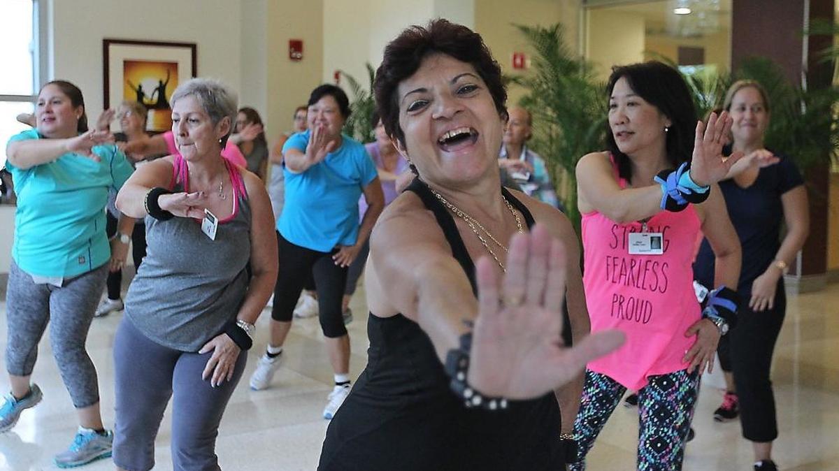 Zoraida Daniel takes a Zumba class at West Kendall Baptist Hospital. Aerobic exercises like running, dancing, Zumba, swimming and bicycling are all good for heart health.