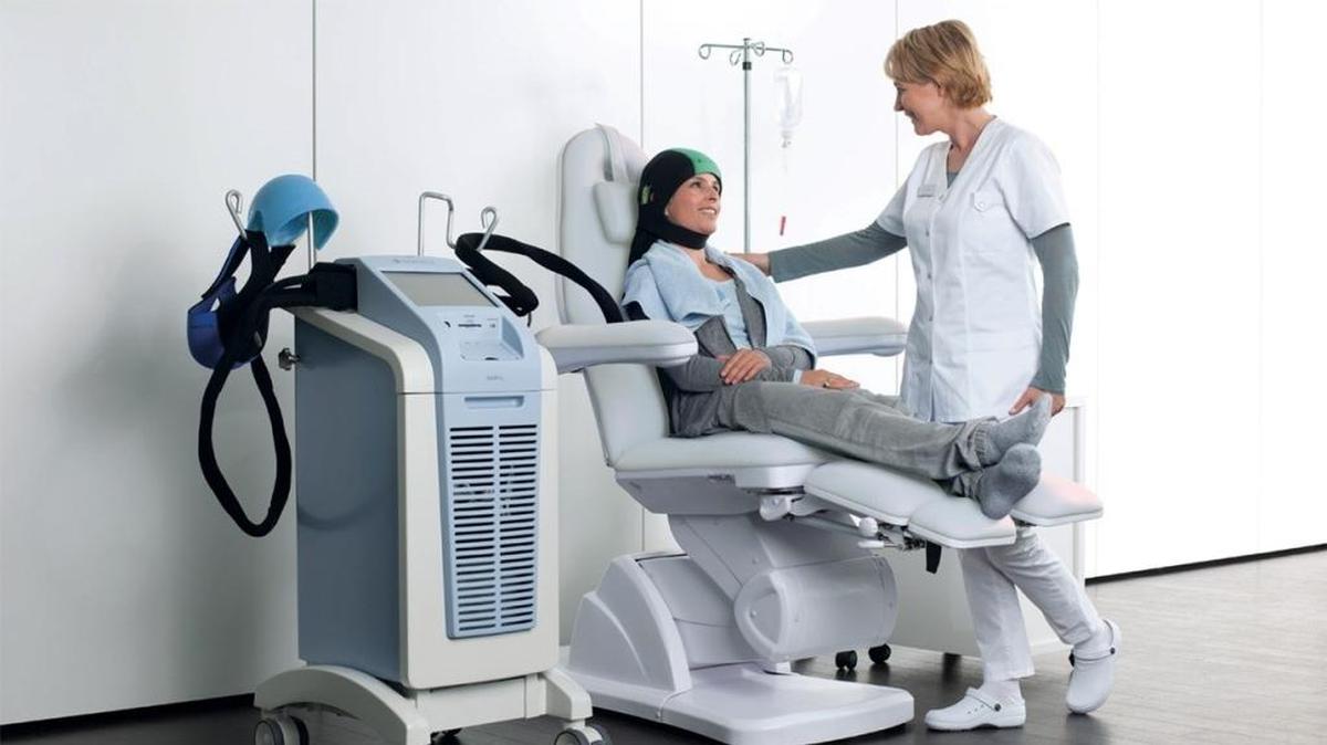 Mount Sinai Medical Center breast cancer patient Rachel Braga is undergoing chemo and sitting with a DigniCap, which has a temperature of around 32 degrees Fahrenheit.
