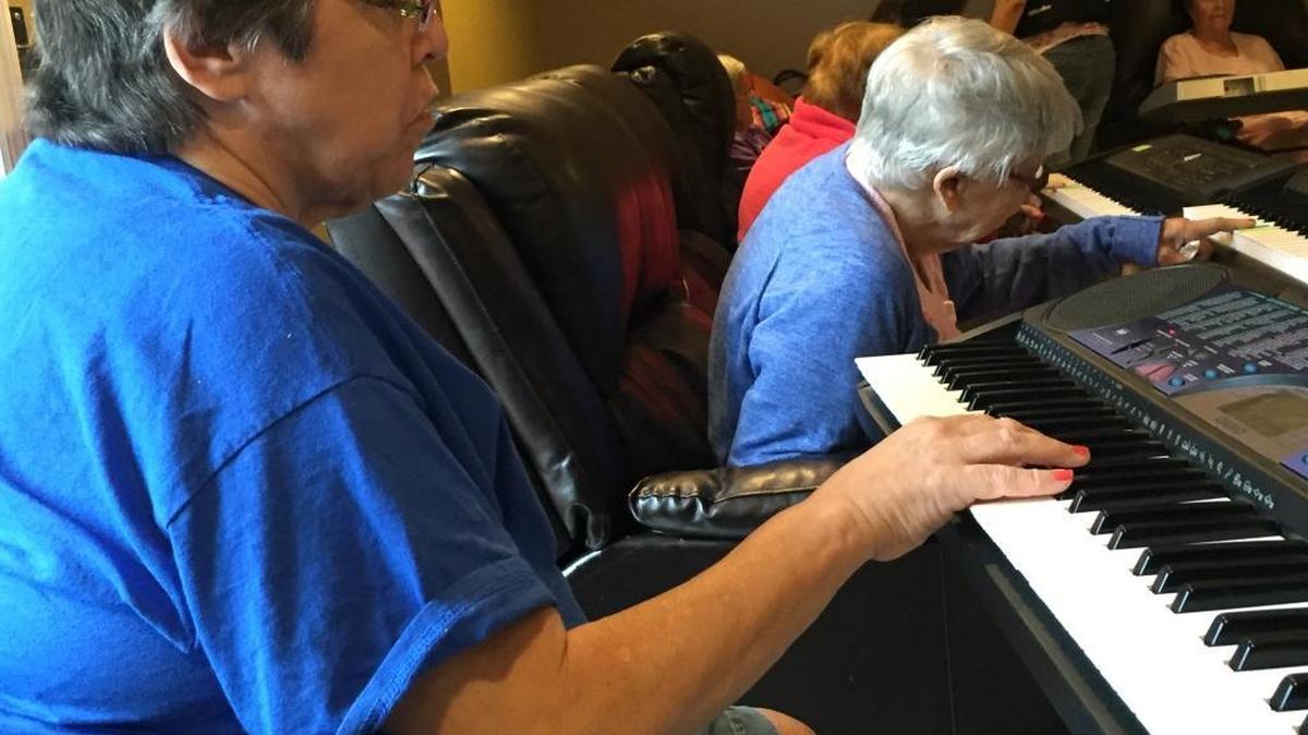 Participants with dementia in the Mind&Melody enrichment program learn to play pianos and learn basic music theory. The program is offered through Plaza Health Network’s South Pointe Plaza center in Miami Beach