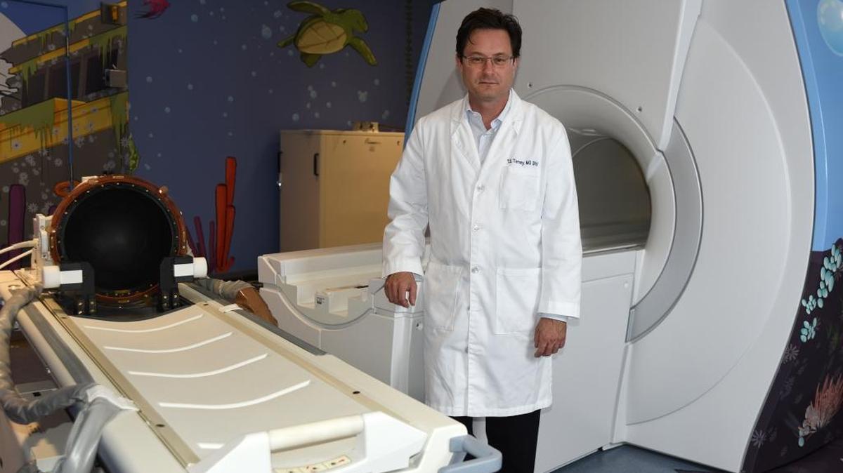 Dr. Travis Tierney with the MR-guided focused ultrasound technology at Nicklaus Children’s Hospital.
