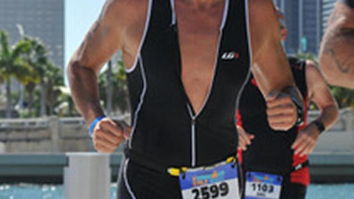 Javier Riva finishes the Ironman 70.3 in Miami in 2016. The race consists of a 1.2-mile swim, a 56-mile bike ride and a 13.1-mile half marathon.