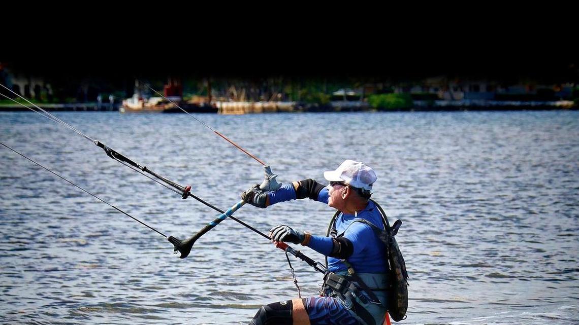 
Louis Gomez, 77, of Pinecrest, trains on a kiteboard after using paddleboards for many years. ‘I’m fairly fit for my age. As I’ve gotten older, [Paula Ambrosio] has made me stronger.’
