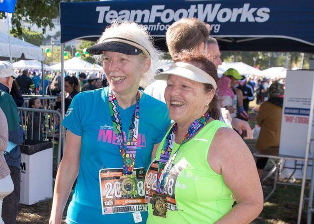 Joan Chrissos, left, and Alina Cruz, right, after completing the Miami Half Marathon on Jan. 25, 2015.