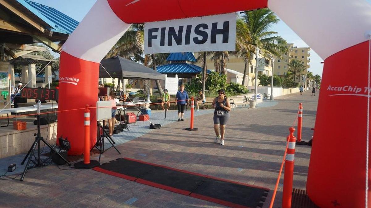 
Marilyn Garateix approaches the finish line in a 5K she ran in Hollywood to help reclaim her life after a diagnosis of Parkinson’s disease. 
