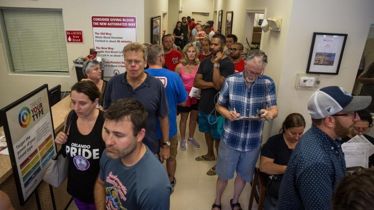 Donors line up outside OneBlood Blood Donation Center in Orlando, on Sunday, June 12, 2016. The center was flooded with donors after a mass shooting early Sunday morning at a gay nightclub, Pulse, in Orlando. A gunman wielding an assault-type rifle and a handgun opened fire inside the nightclub early Sunday, killing 49 people before dying in a gunfight with SWAT officers, police said. It was the worst mass shooting in American history.