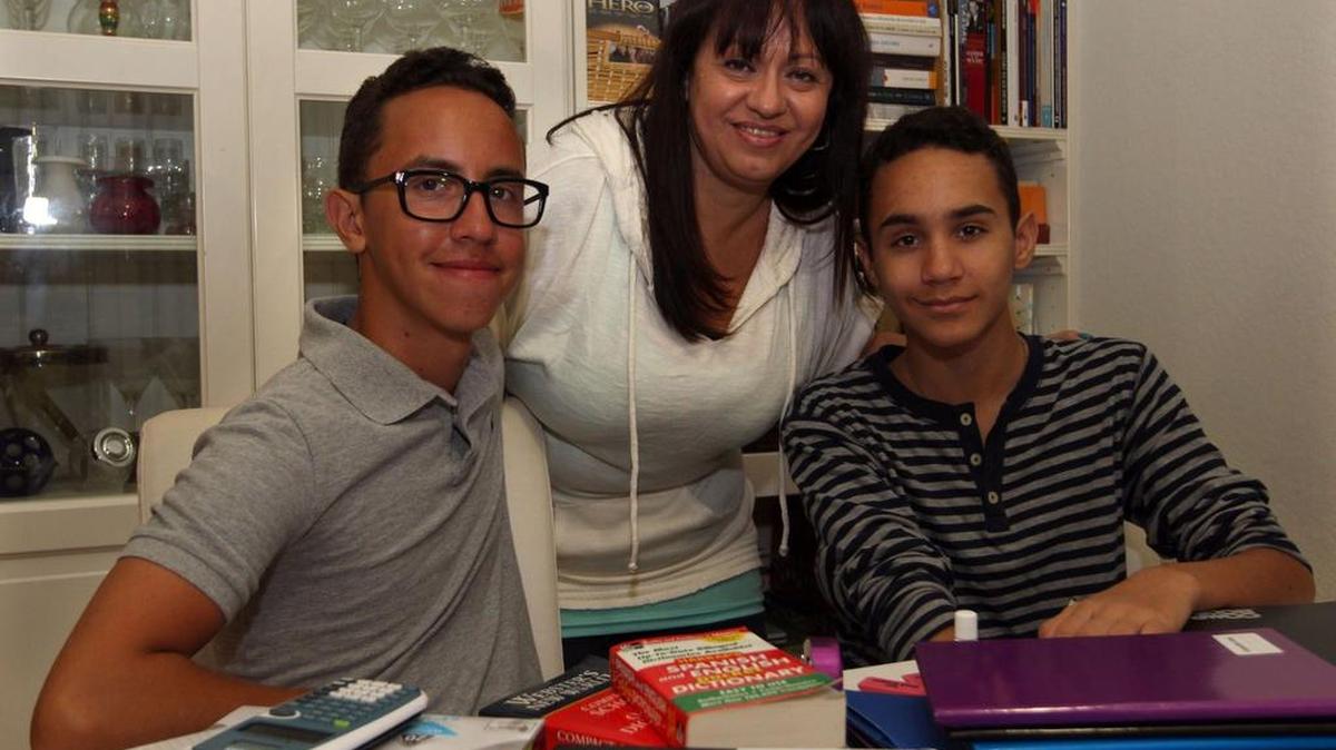 
Preparation: Maria Gabriela Salas, with sons Armando, left, and Gabriel Torrealba, helps the teens stay focused.
