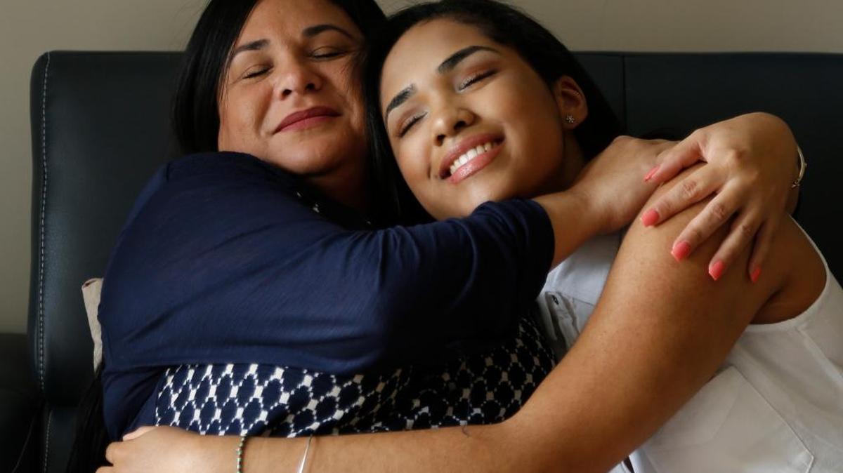 Janelle Bombalier, right, with her mother, Yenissel Bombalier, 43, at their West Perrine home.